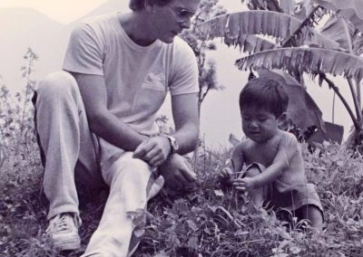 Patrick Atkinson with a young child